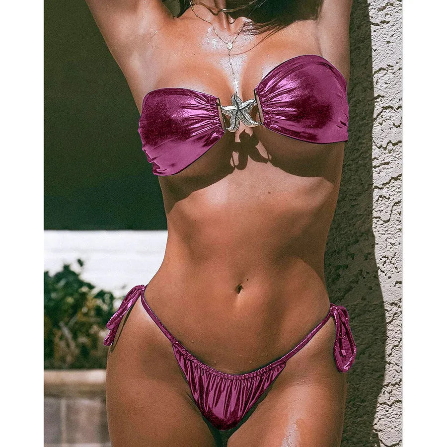 Women's glossy sapphire blue tube top bikini with long sleeves and backless design.