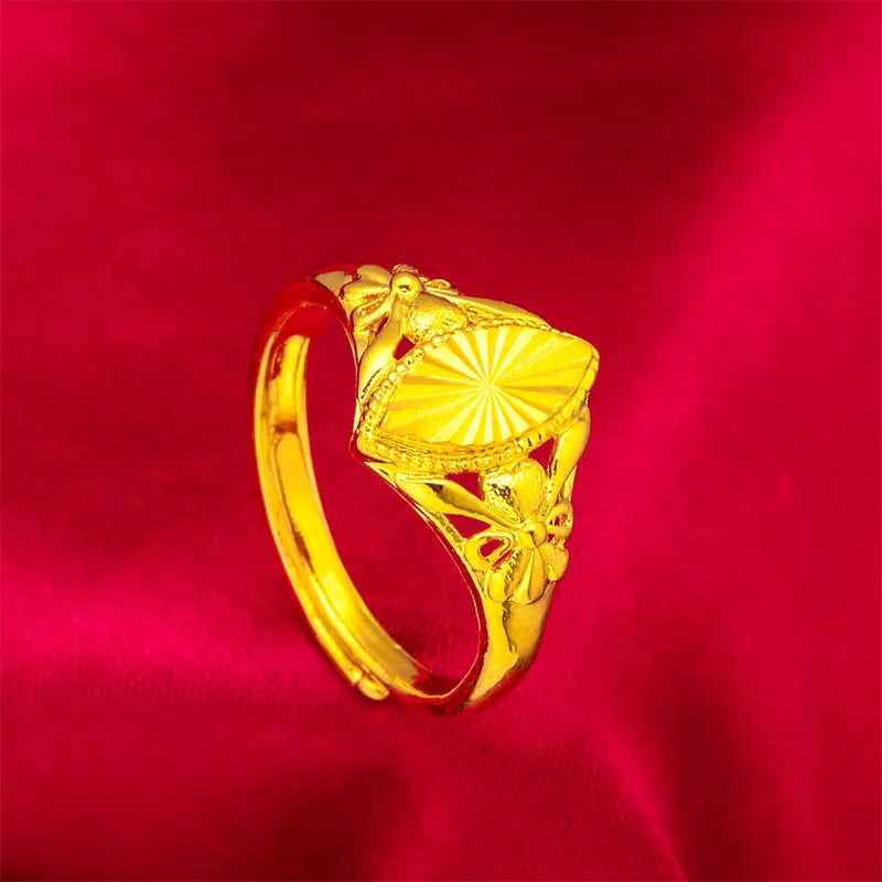Geometric open ring with textured diamond flower pattern in electroplated gold finish