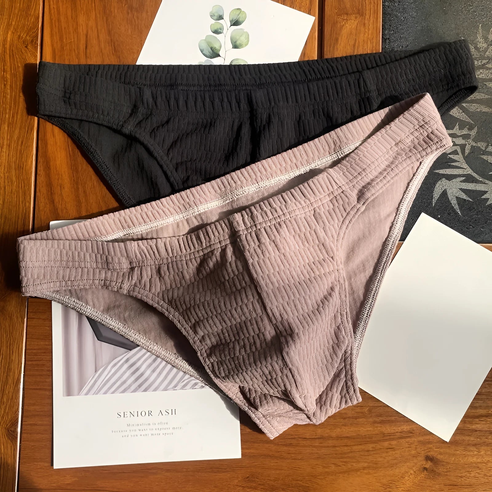 Men's solid colour pure cotton triangle briefs with a mid-waist body-shaping design.
