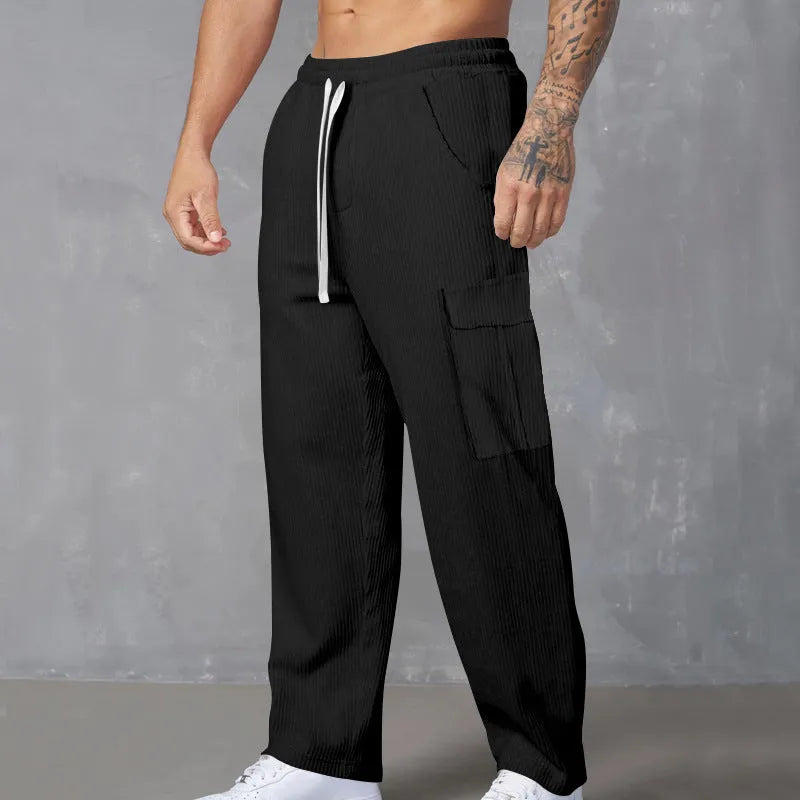 Men's straight-leg corduroy cargo trousers in brick red with a drawstring waist