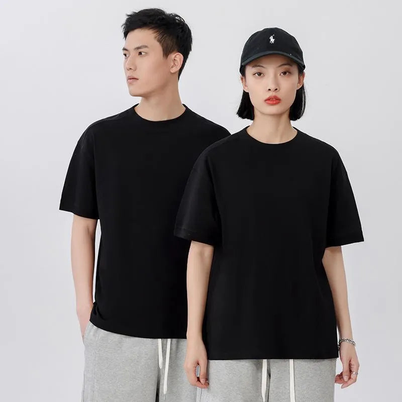Breathable pique short-sleeved cotton T-shirt in loose fit, solid colour, summer wear