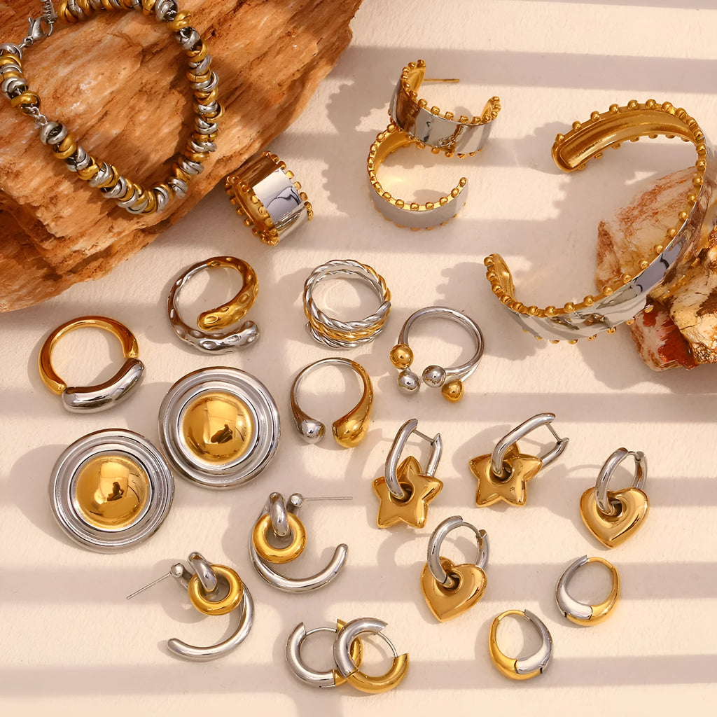 Women's gold electroplated geometric jewellery set with earrings, bracelet and necklace on stainless steel