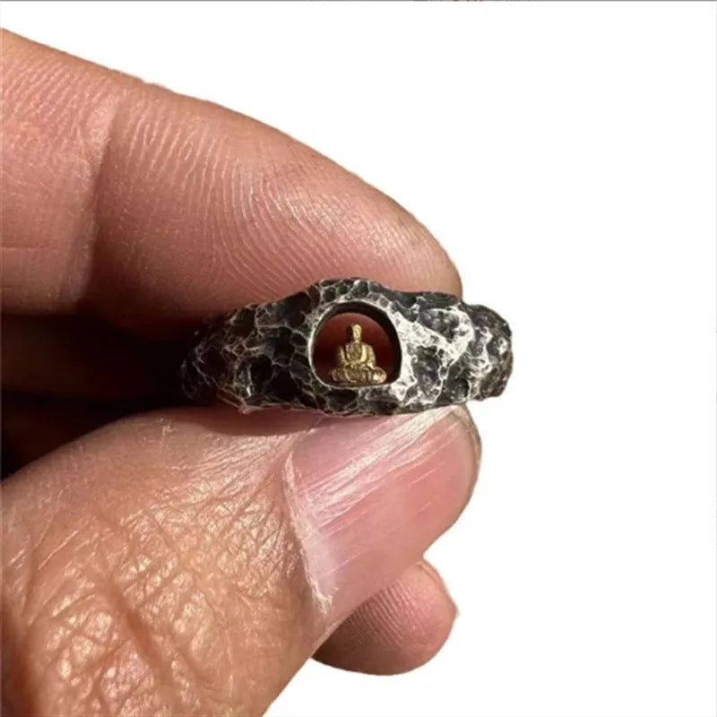 Hand-forged copper Buddha ring with grotto rock texture, shown in size 8.