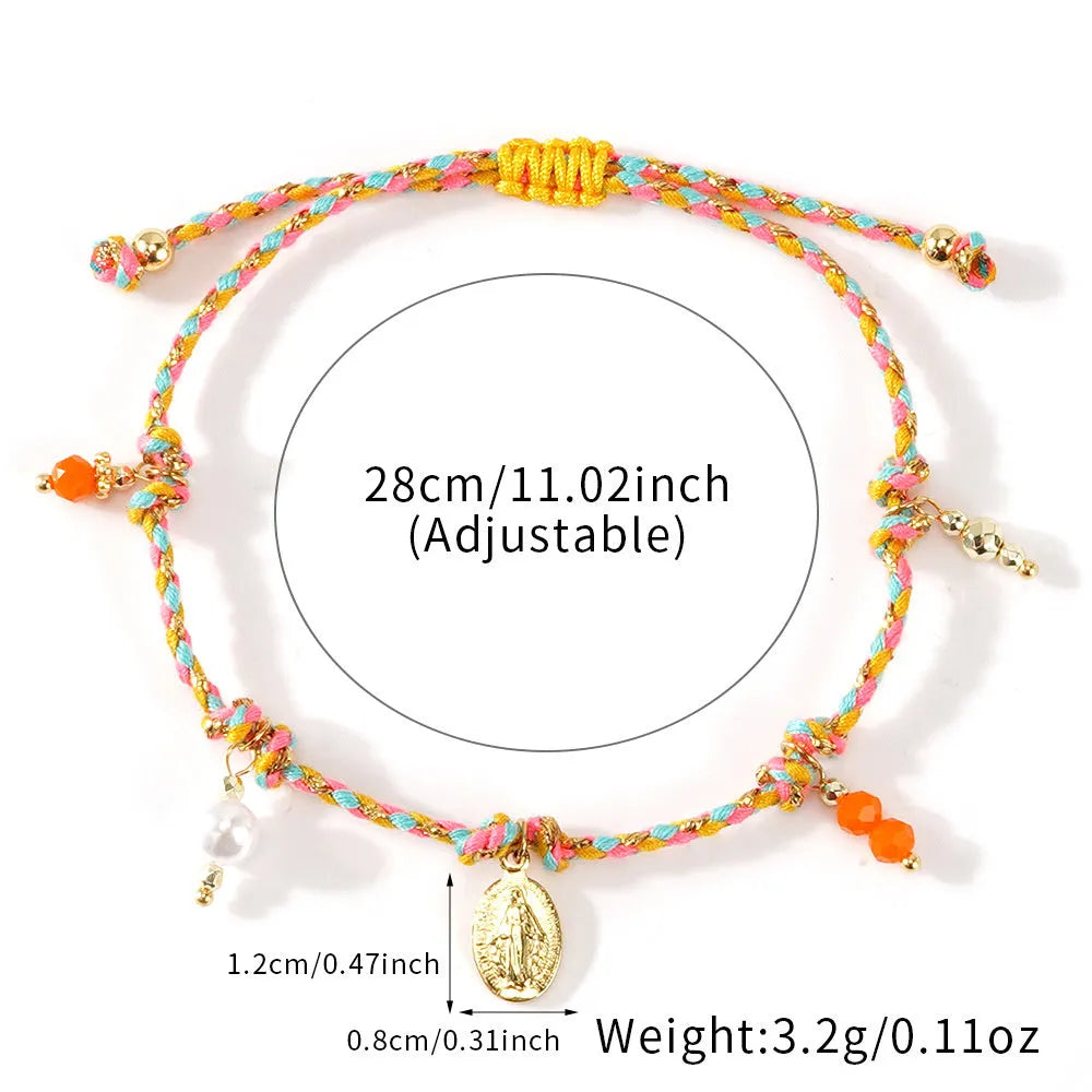 Close-up of a hand-woven colourful braided rope bracelet with an adjustable strap tag, showing ethnic style design.