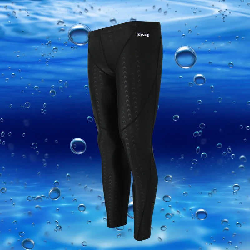 Men's black cropped nylon swimming trunks with mesh lining, shown on size chart