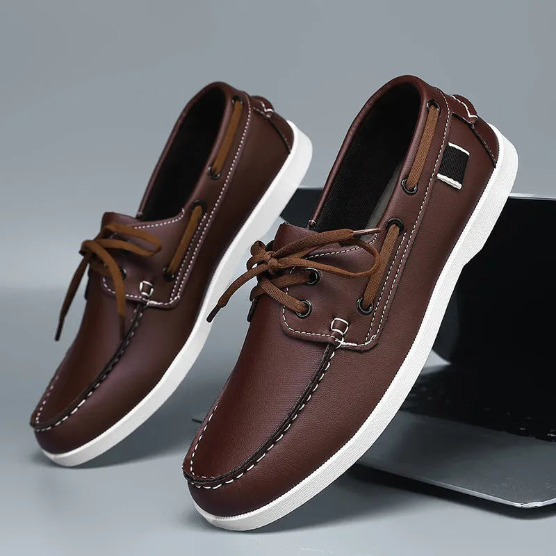 Men's black casual Oxford-style shoes with artificial PU leather upper and flat heel on a white background.