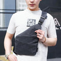 Anti-theft crossbody bag for men in black Oxford cloth with zipper closure