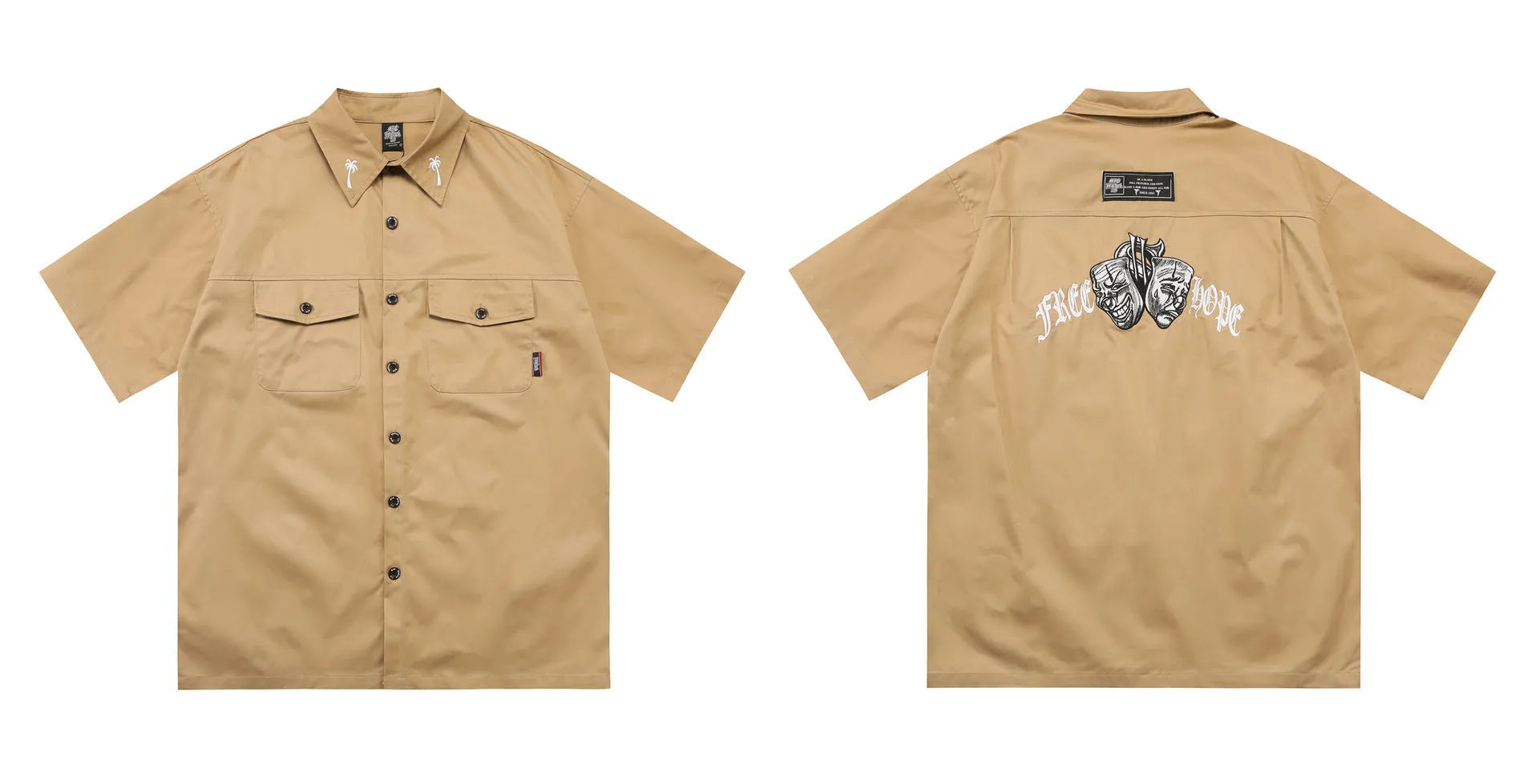 Men's black plus-size loose fit work shirt with a chest pocket and embroidered detail on the sleeve.