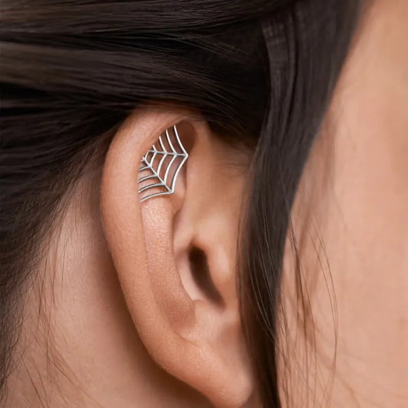 Spider web geometric mesh stud earrings in gold and silver electroplated metal for Halloween
