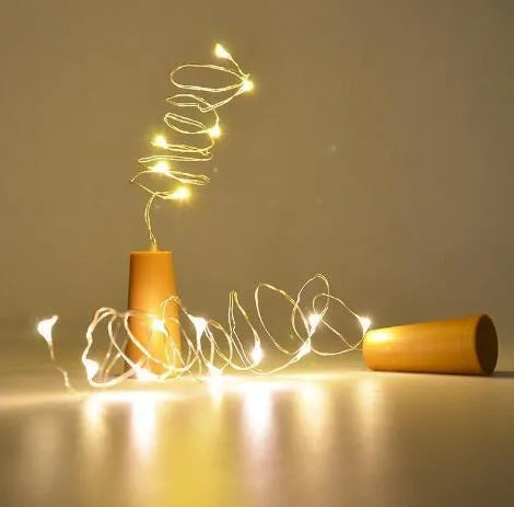 Wine bottle LED string lights with copper wire and bottle stopper for decorative illumination