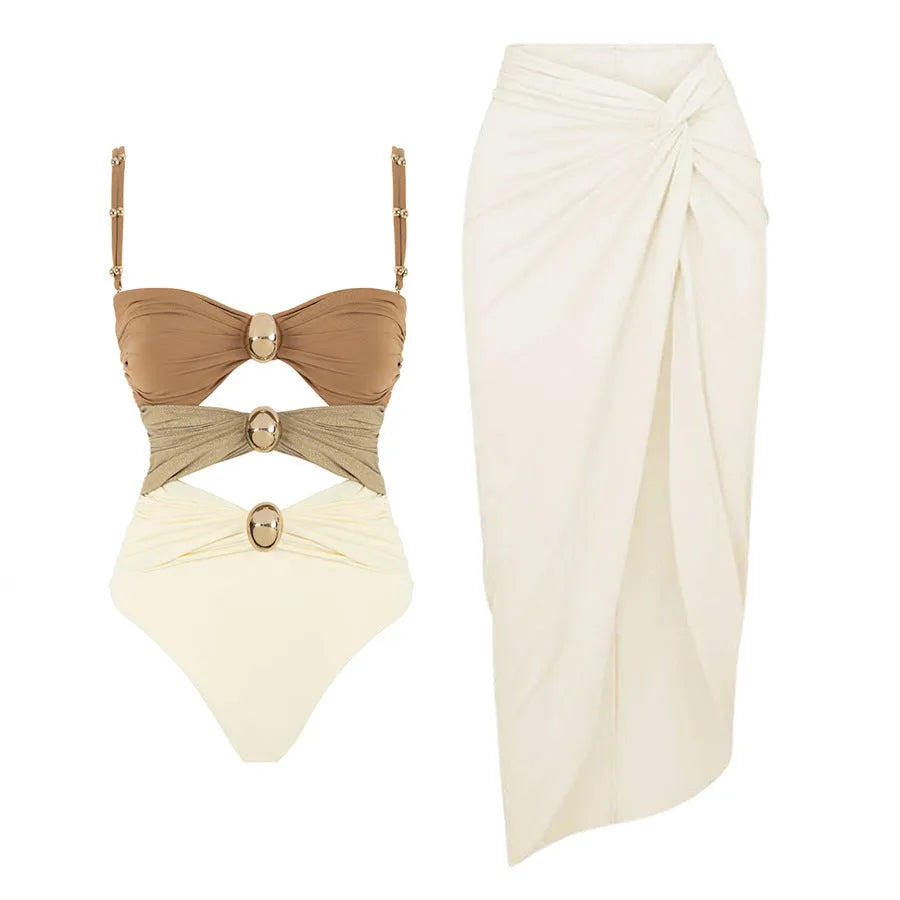 Women's one-piece swimsuit with skirt and gold buttons in solid colour options