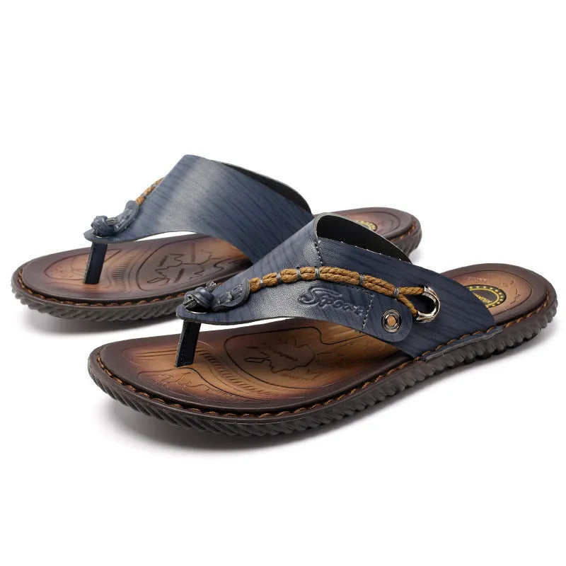 Men's dark blue herringbone pattern outdoor slippers with a rubber sole, shown from the side.