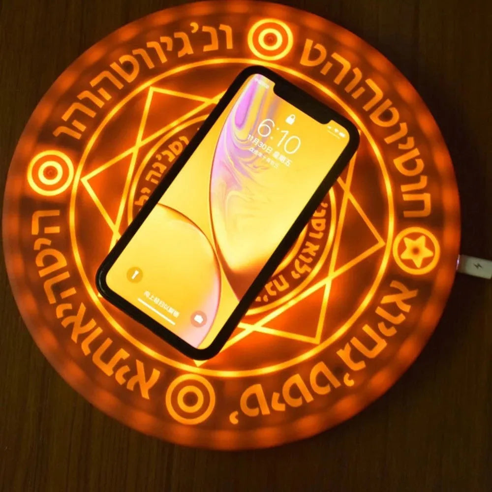 Square wireless phone charger with glowing magic array pattern showing 10W fast charging