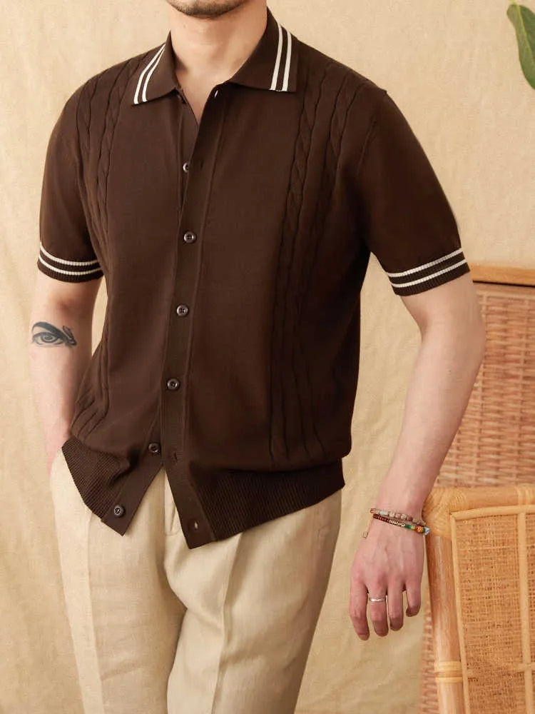A short-sleeved lapel polo shirt in a cotton blend fabric, shown in apricot colour on a hanger.