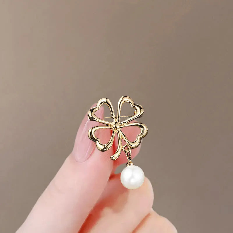 Alloy brooch in natural flower shape with electroplated finish, featuring adjustable and anti-exposure pin closure for women's coats and suits.