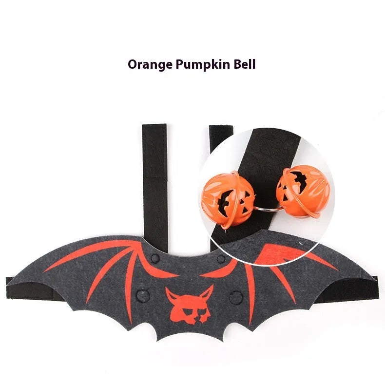 Halloween batwing costume for a cat or small dog made from orange and black felt.