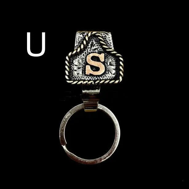 Handmade stainless steel cow tag belt key holder with engraved number plate on a split ring.