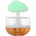 White raining cloud shaped humidifier with colour changing night light and water droplet mist