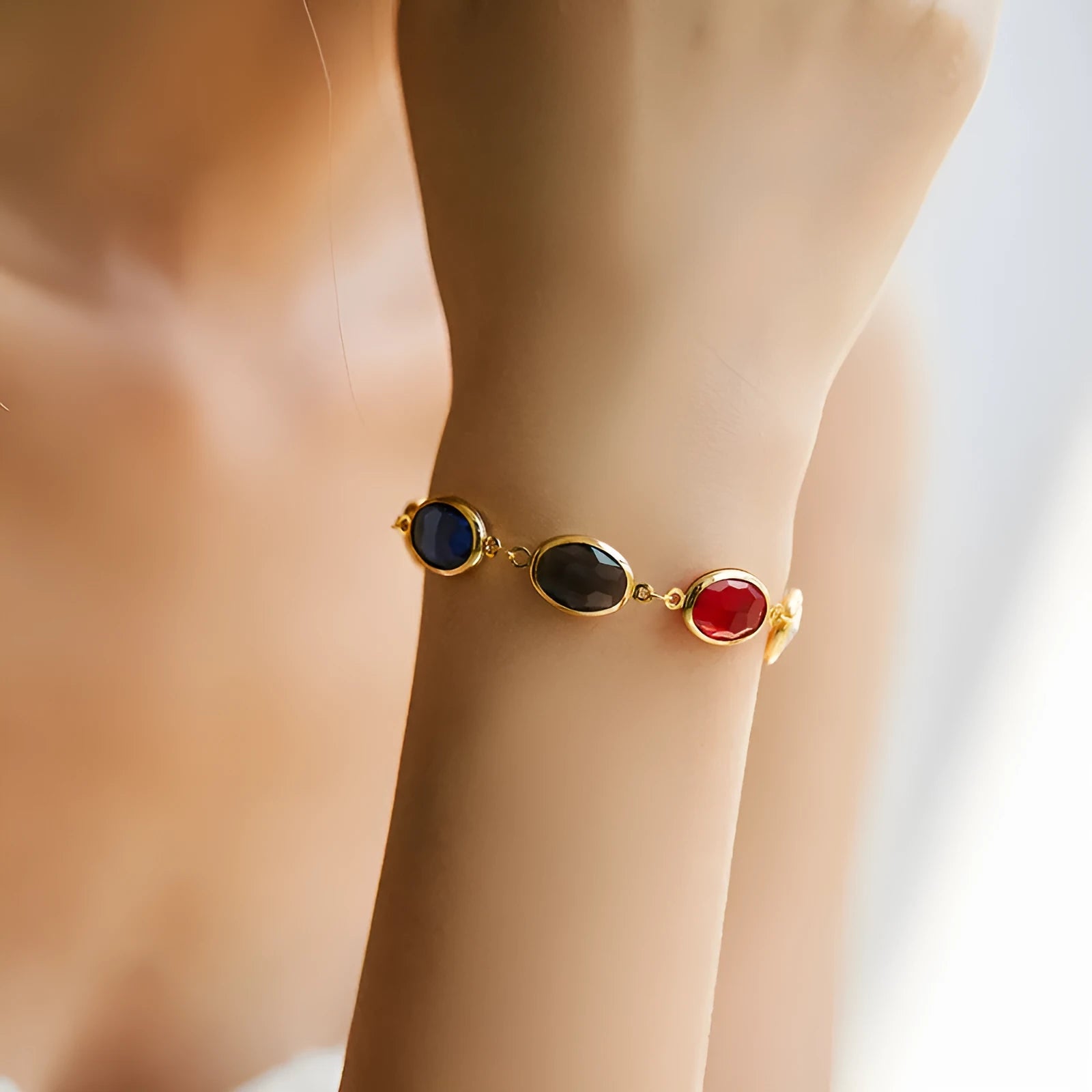 Women's geometric ellipse bracelet with 18K copper and coloured glass inlay beads in blue, green, and multicolour options