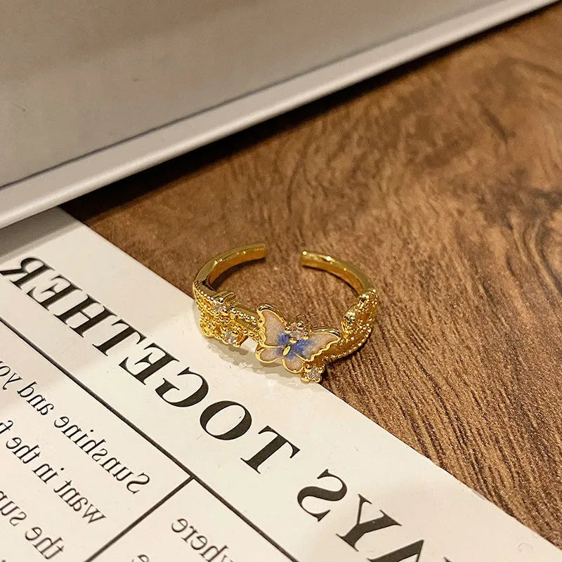 Chinese butterfly design women's ring in polished copper with oil drip texture