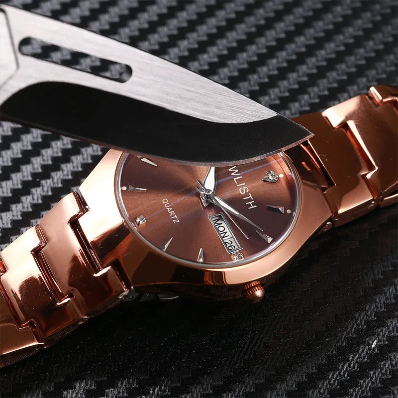 Coffee gold luminous couple watch with alloy strap and mineral glass dial displayed on light background