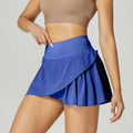 Women's solid colour quick-dry sports shorts in nylon with spandex lining for summer fitness.