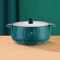 Electric non-stick pot with integrated heating element and stainless steel body in white finish