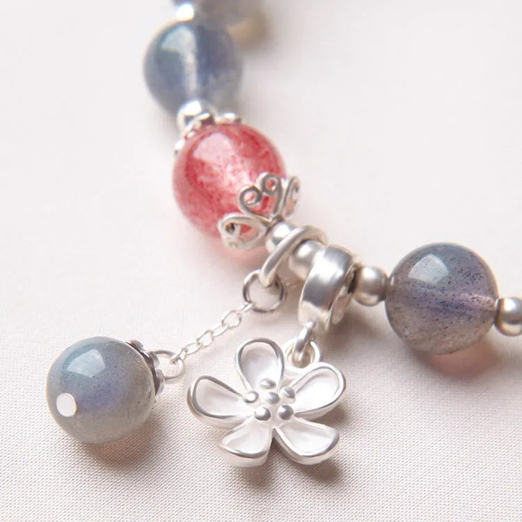 Women's 925 silver bracelet with grey moonlight and strawberry crystal beads measuring 7.5mm with honeysuckle design