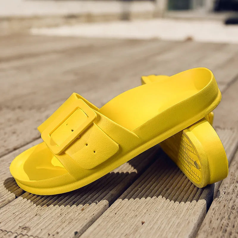 Women's grey blue flip-flop slippers with a buckle strap and soft EVA sole.