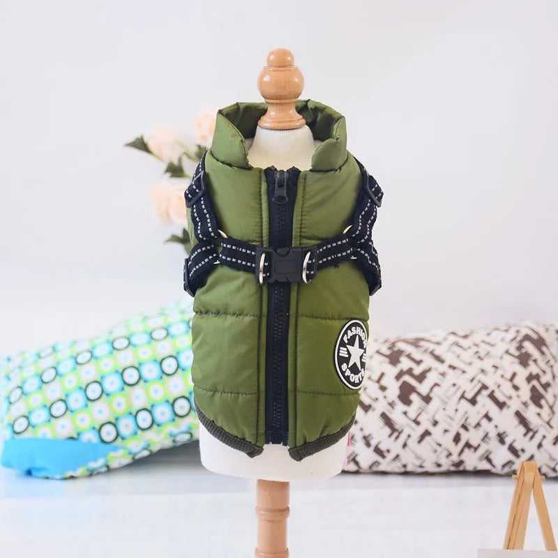Waterproof dog coat with integrated harness in red, shown on a dog