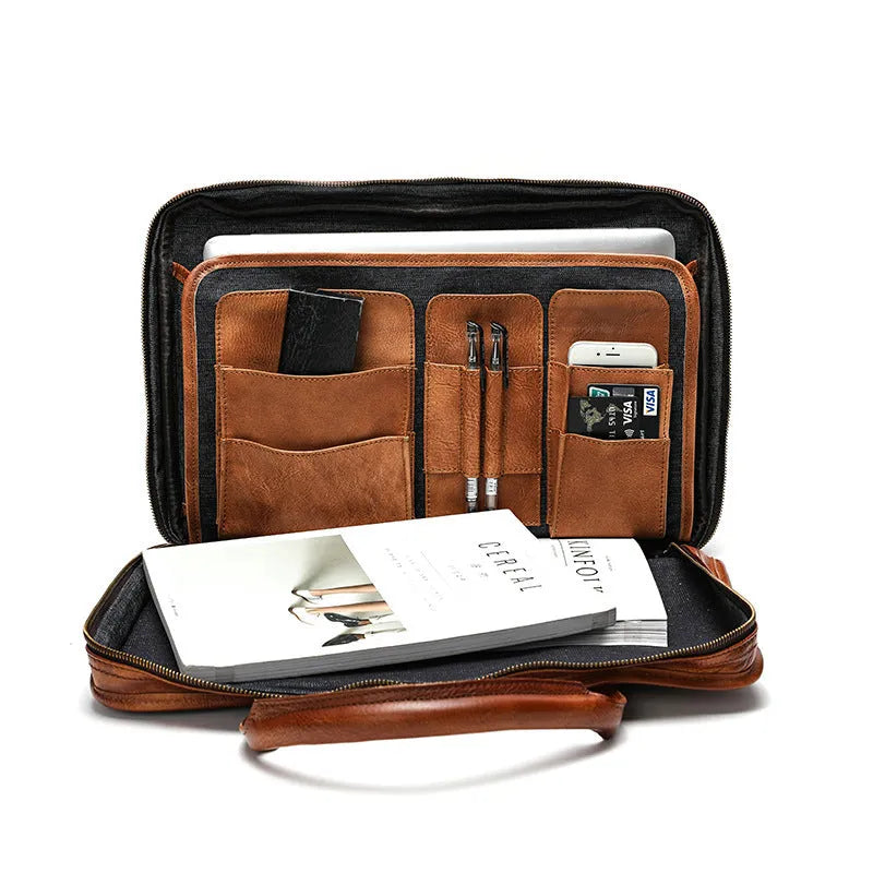 Brown vintage leather men's briefcase showing internal laptop and document pockets
