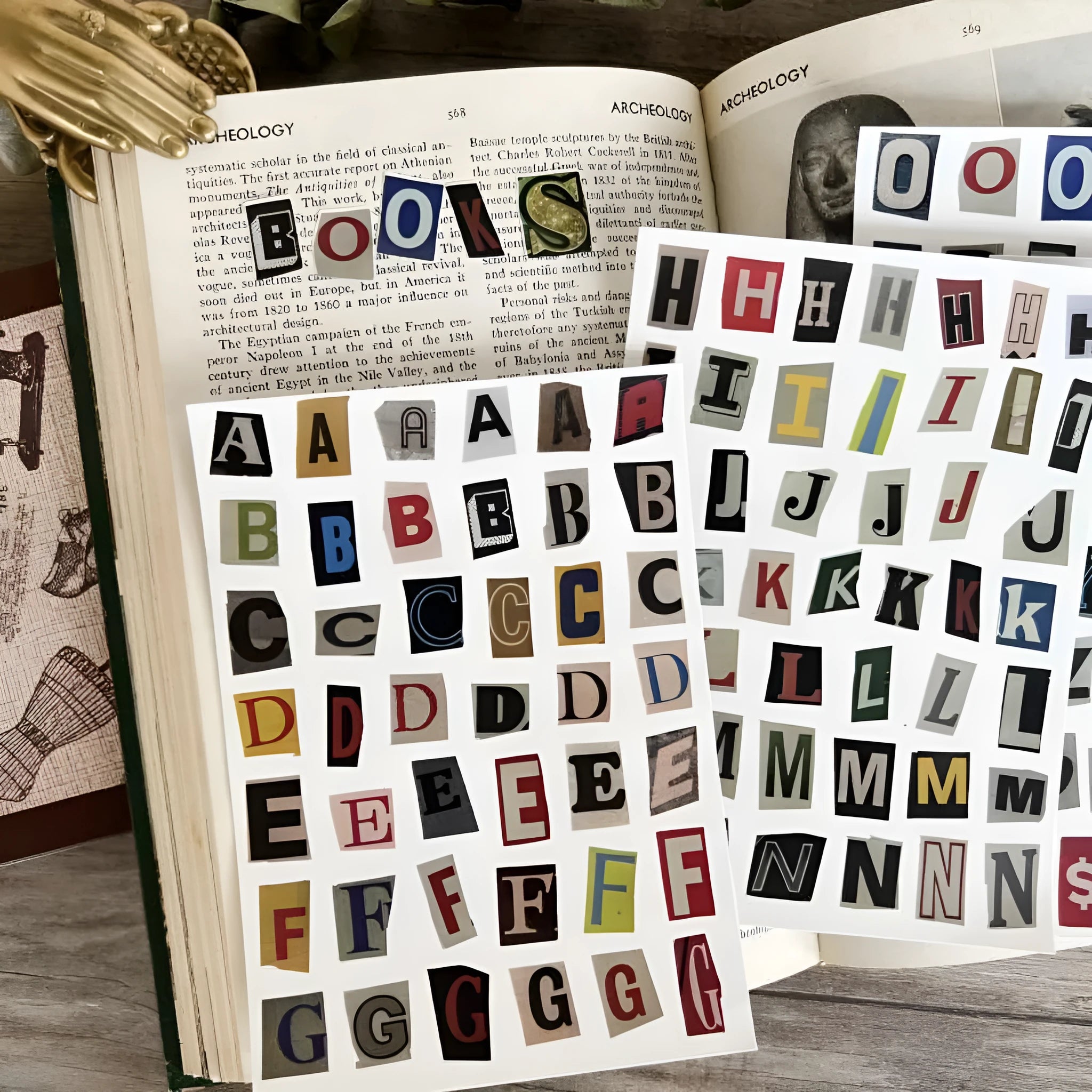 Set of printed cute style decoration stickers showing English letters, numbers, and weekly words on sheets.