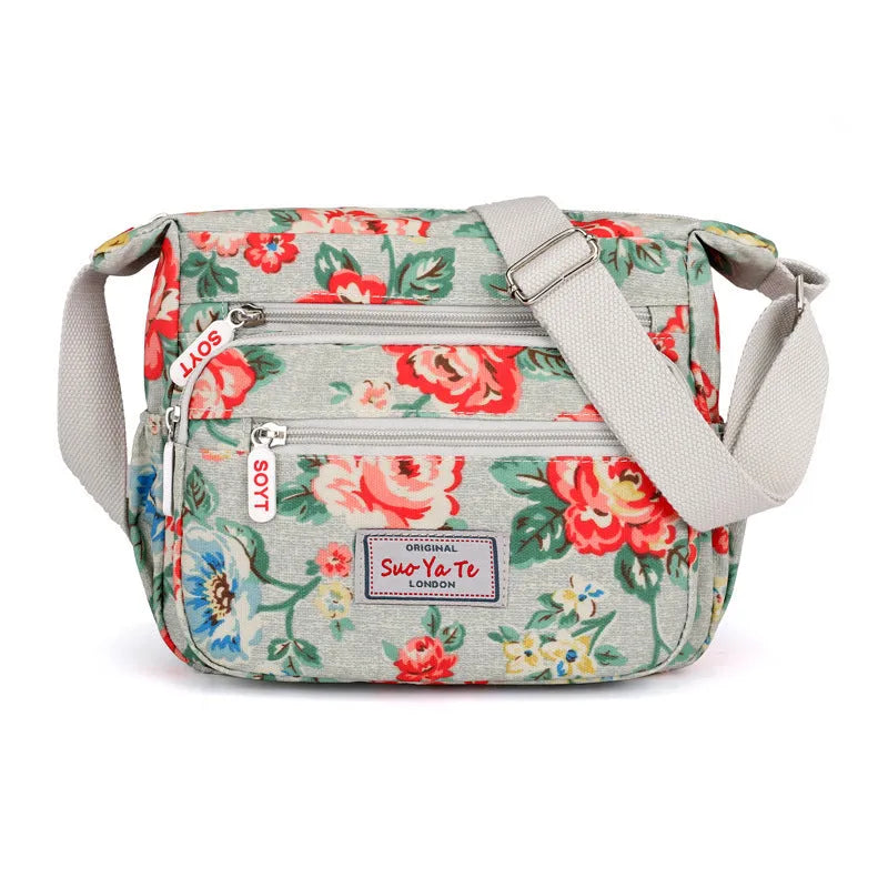 Lightweight printed nylon shoulder bag with double straps and floral or butterfly design