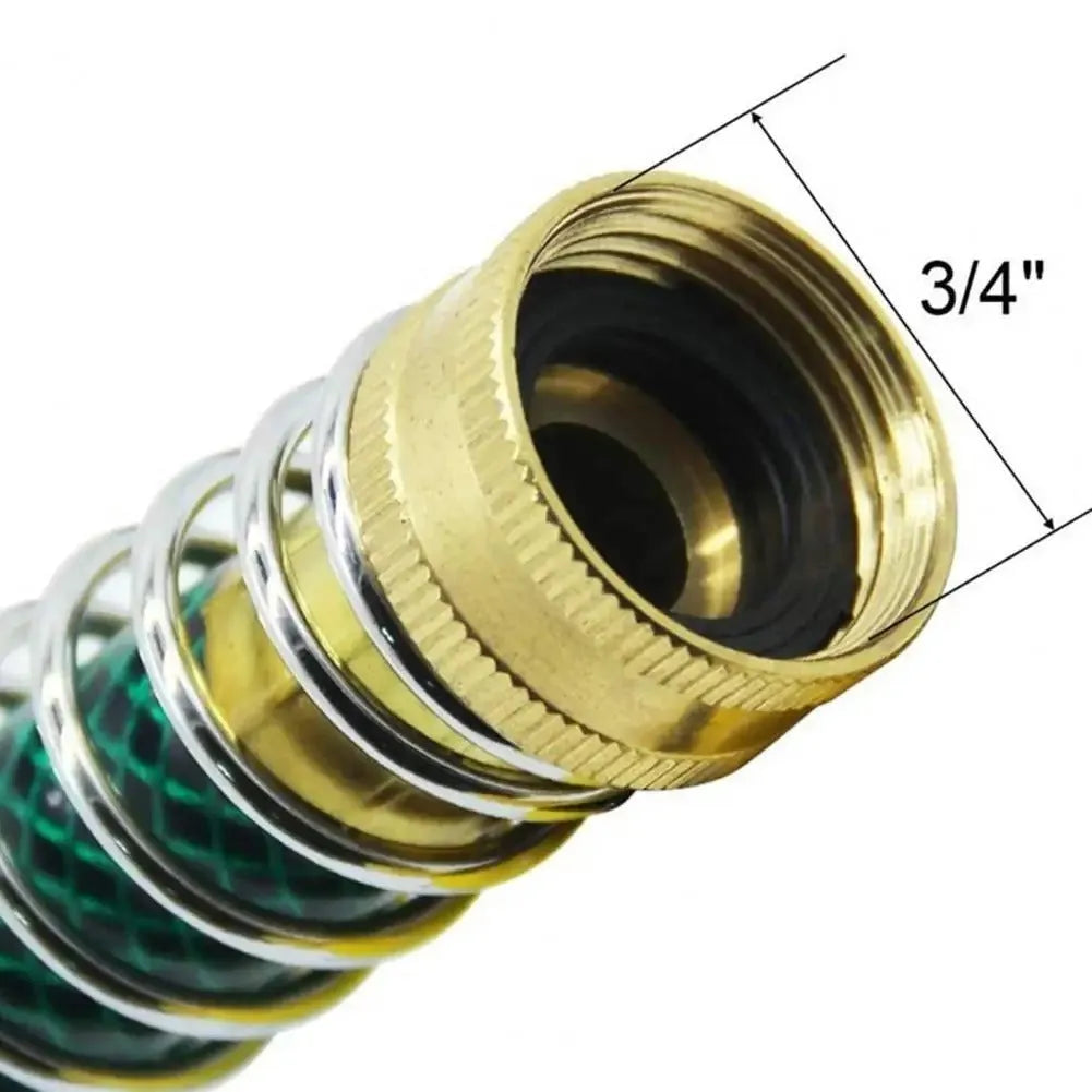 Close-up of a 15cm long brass garden hose spring connector with a visible internal spiral to prevent kinking.