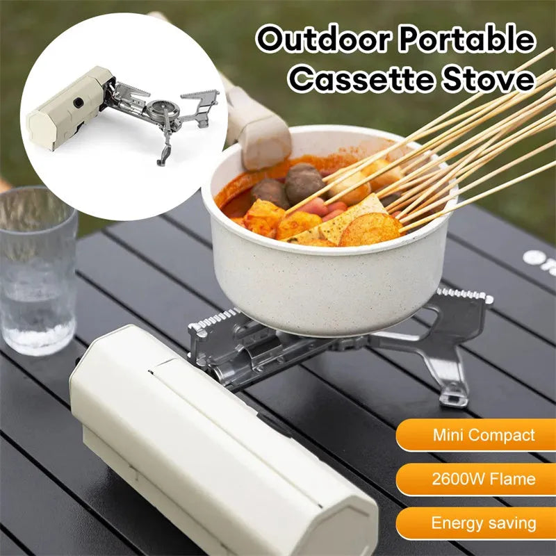 Green folding camping gas stove with adjustable valve and anti-slip feet for outdoor cooking