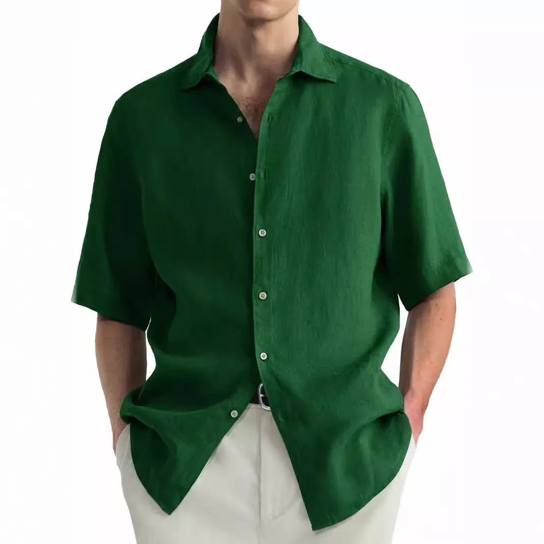 Green washed cotton men's casual shirt in a cardigan style, laid flat.