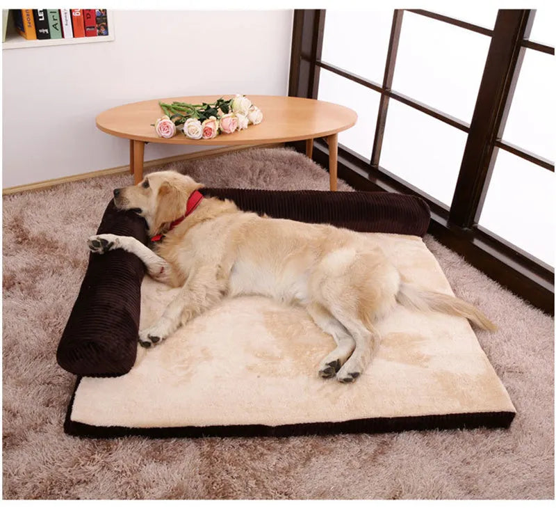 Corduroy bolster dog bed with non-slip base in grey, showing S M L XL size comparison.