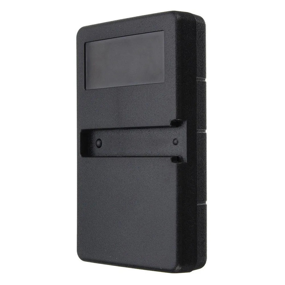 Black three-button garage door remote control on a white background.