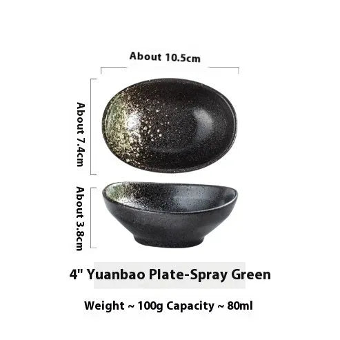 Oval Japanese ceramic sauce dipping bowl with underglaze finish on a table.