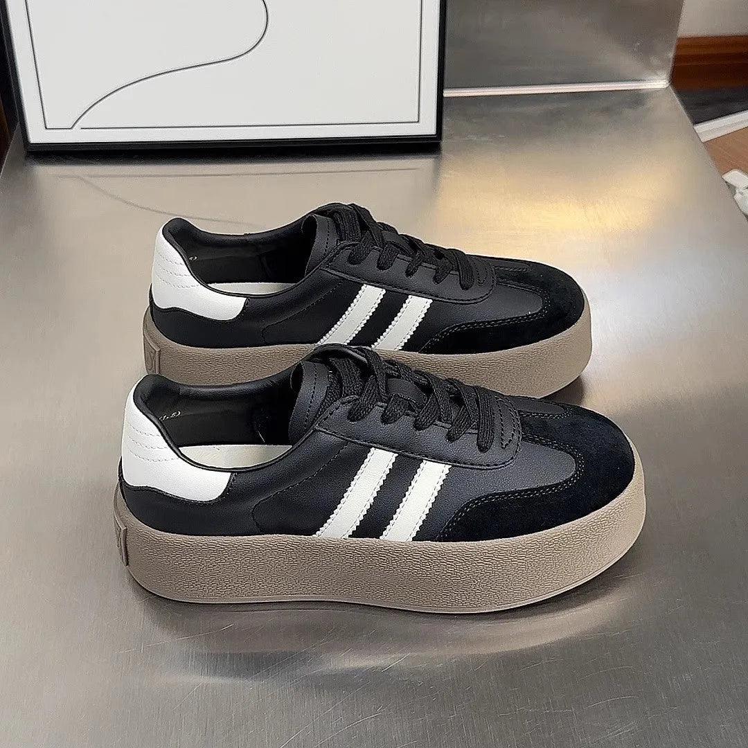 Women's vintage distressed leather sneakers with round toe and lace-up front