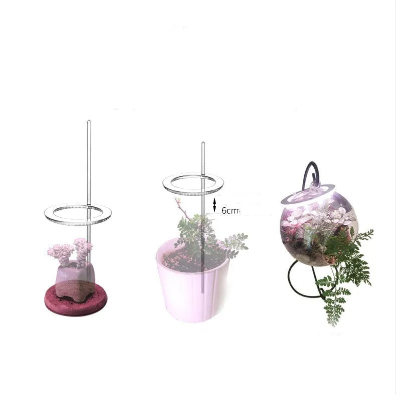 USB LED full spectrum plant grow light with acrylic stick on a table.