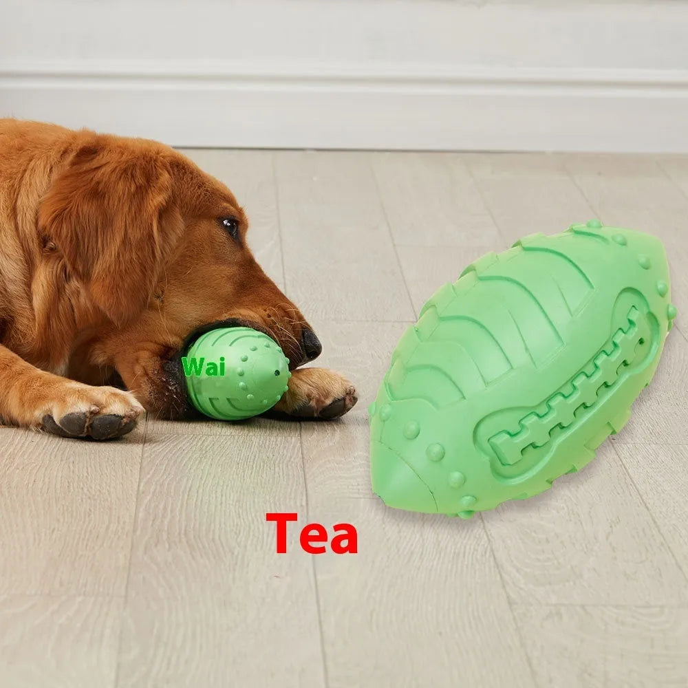 Light green rubber rugby ball dog toy with textured surface for teeth cleaning and training
