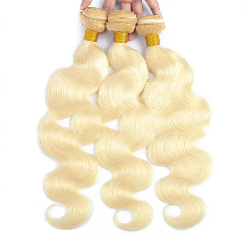 Light gold 613 body wave wig with snake wavy texture on a mannequin head showing 16-24 inch length options
