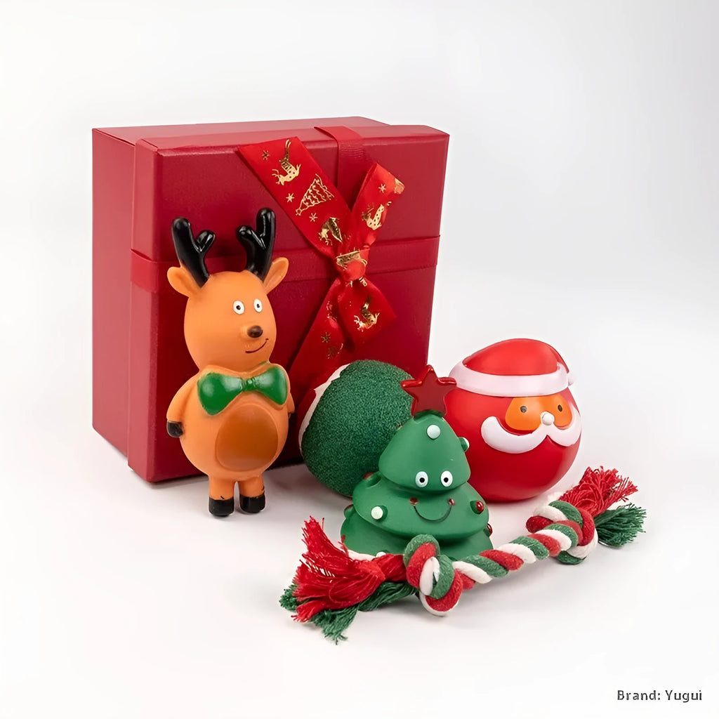 Christmas vinyl dog toy set with Santa Claus heads, trees, tennis balls, and bite ropes