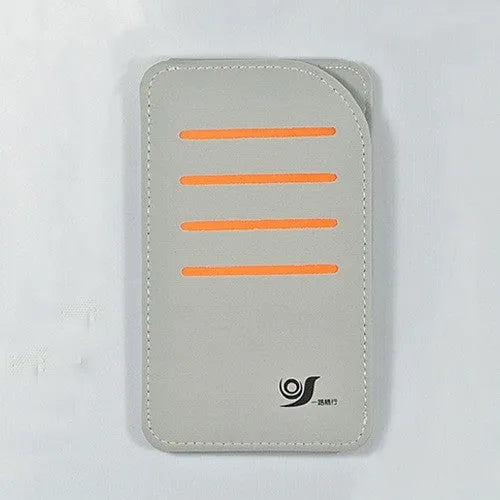 Car dashboard storage organiser with sun visor panels attached to a windscreen.
