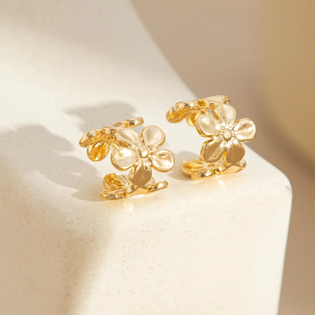 Gold electroplated alloy earrings with starfish and scallop shell designs for women's beach fashion
