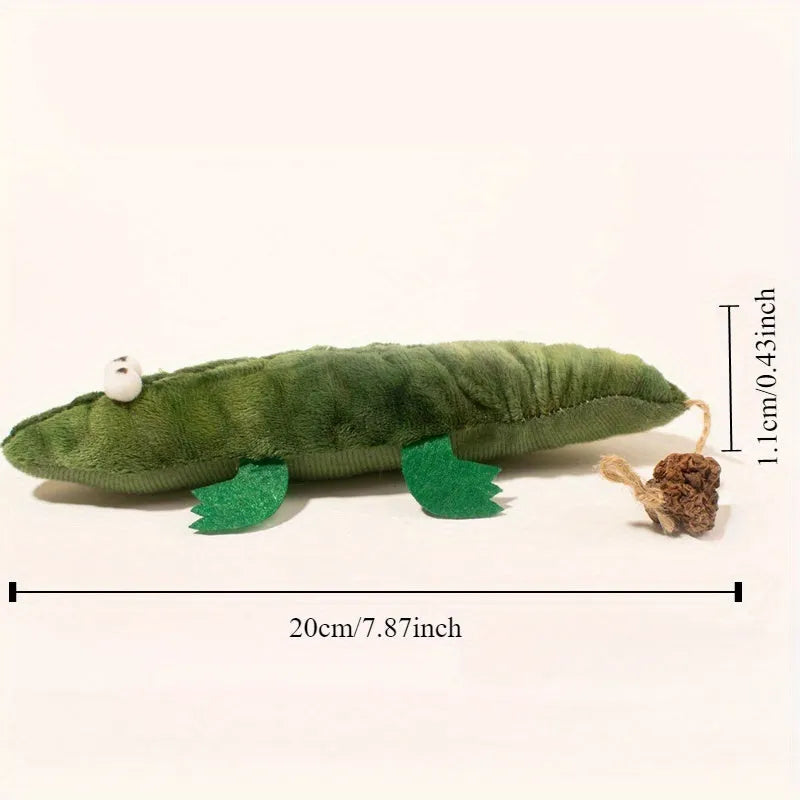 Green plush alligator catnip toy with plant-based filling for feline oral cleansing and stress relief