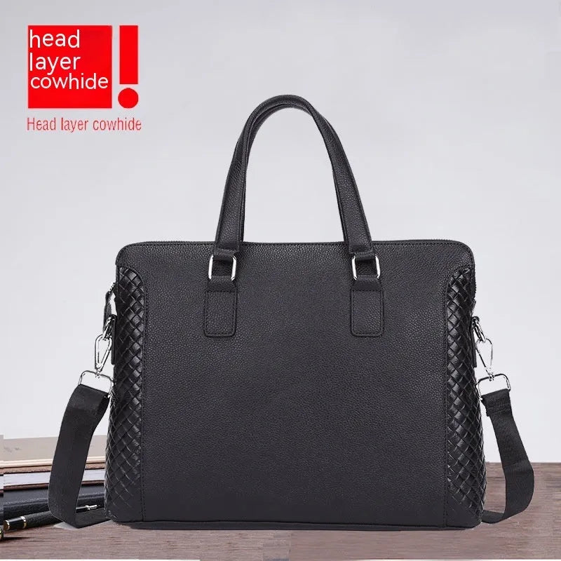 Black genuine leather men's briefcase with embossed weave pattern, horizontal shape, and soft handle for 14-inch laptop