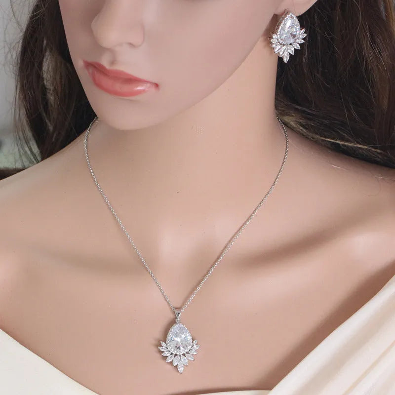 Blue, red, and white formal jewellery chain set with necklace and earrings for bridal banquets.