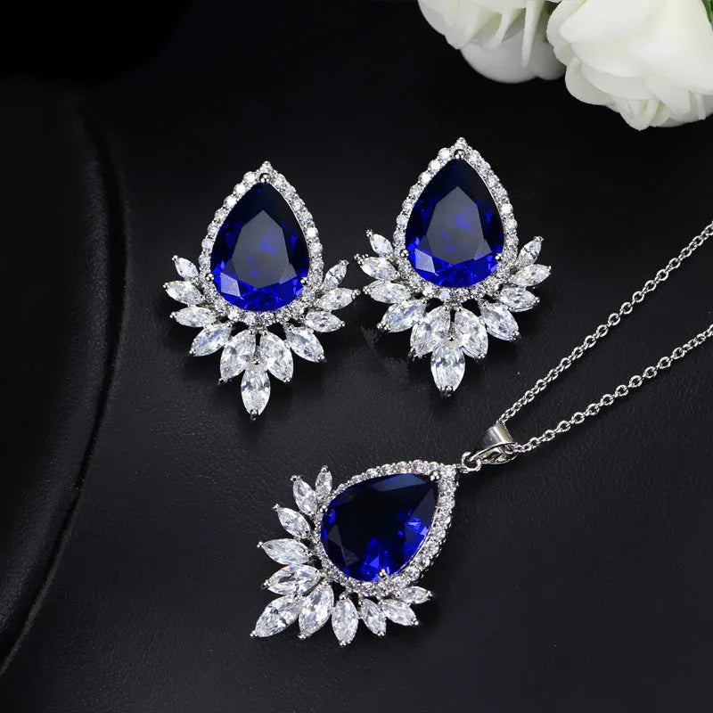 Blue, red, and white formal jewellery chain set with necklace and earrings for bridal banquets.